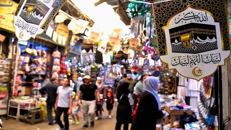 أسواق دمشق تكتسي بالزينة ترحيباً بعودة الحجاج